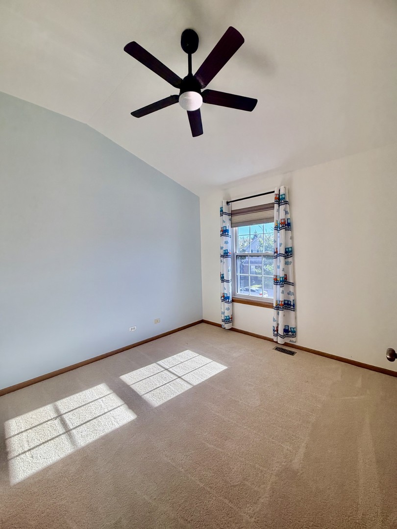4 Haverton Court Streamwood, IL 60107 - Photo 16 of 30 a view of room with air conditioner and window