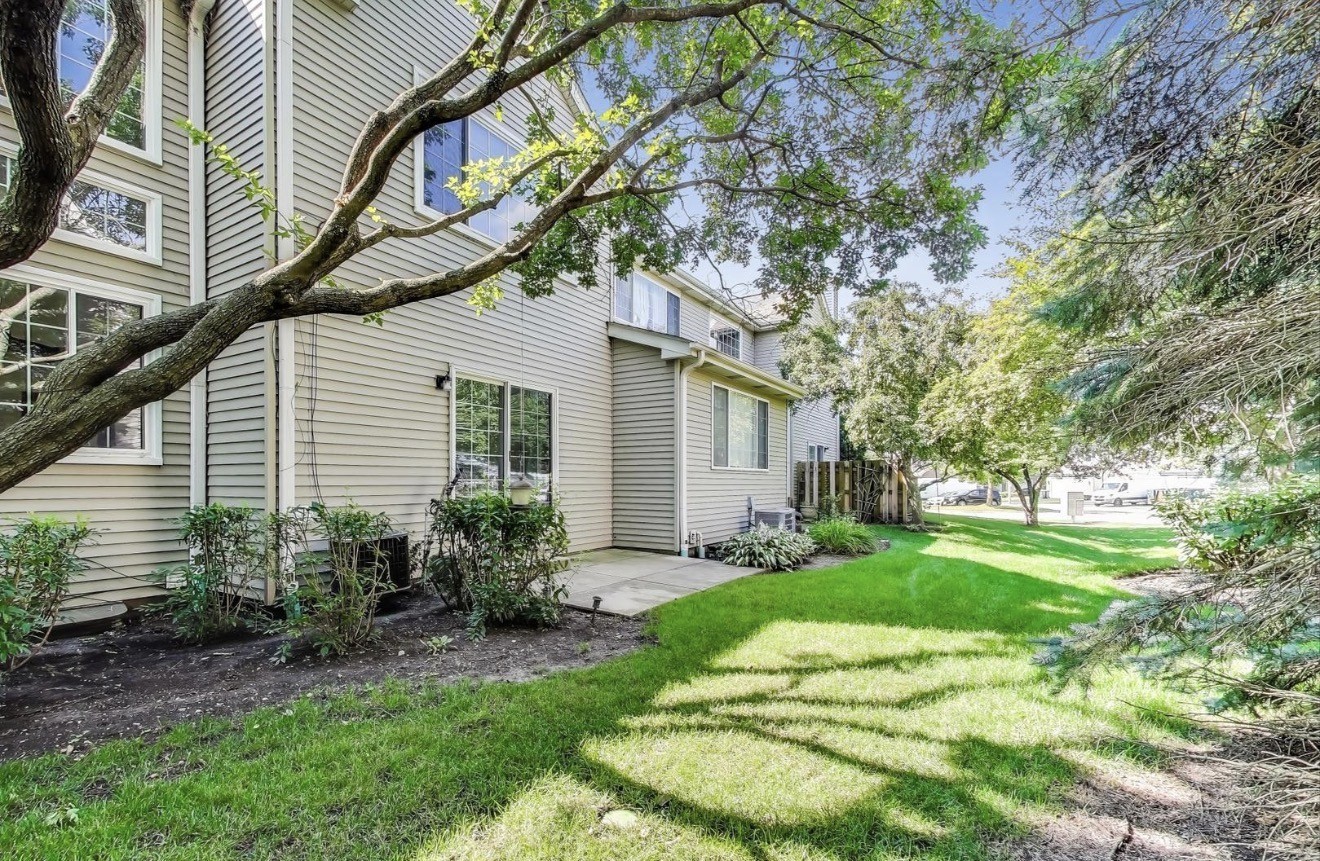 4 Haverton Court Streamwood, IL 60107 - Photo 30 of 30 a view of a house with a yard and plants