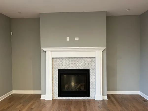 a living room with a fireplace