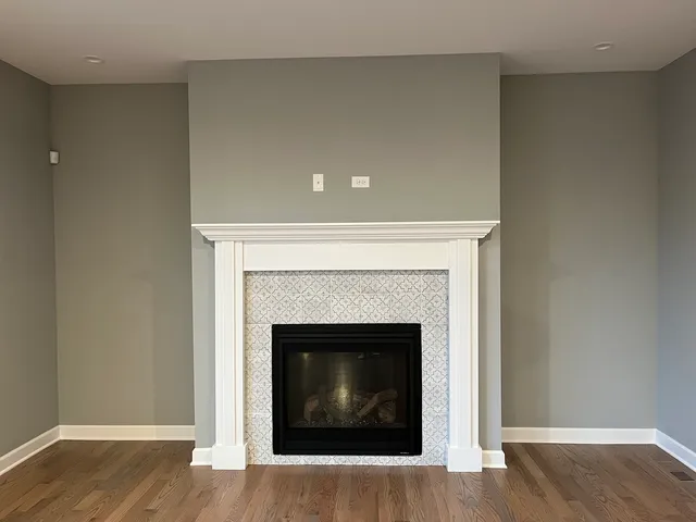 a living room with a fireplace