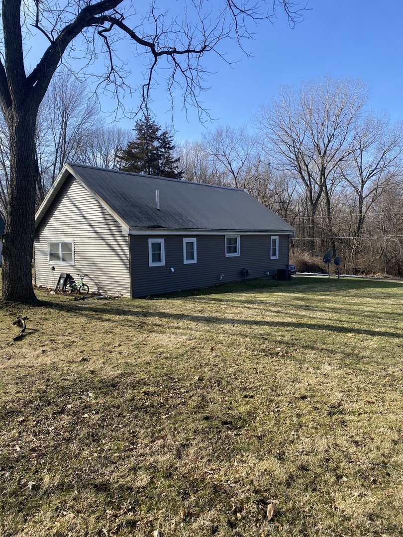 117 3rd Street Mark, IL 61326 - Photo 3 of 4 a view of a house with a yard