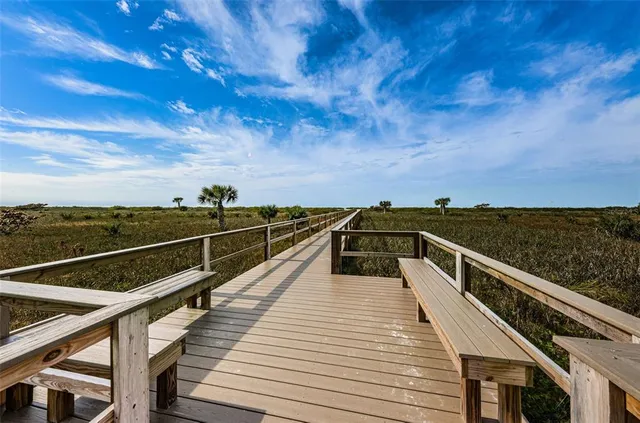 a view of roof deck with seating space