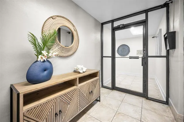 a view of a hallway with washer and dryer