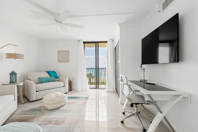 a view of a balcony with an ocean view