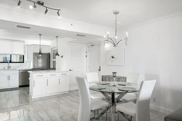 a view of a dining room and furniture