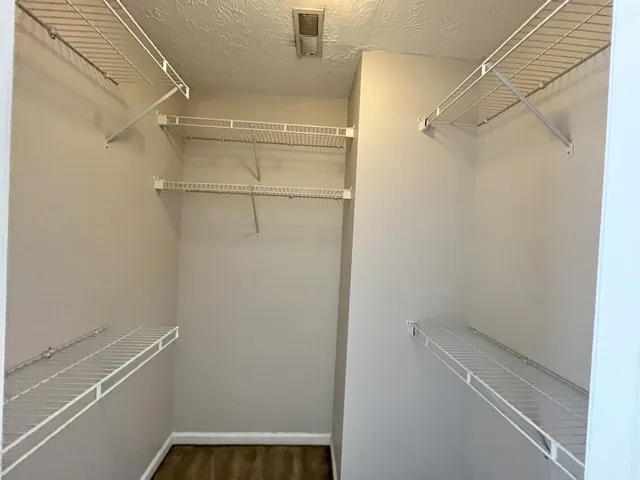 a view of small space with racks on the wall