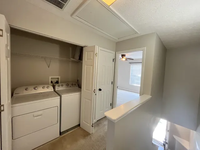 a storage room with a washer and dryer