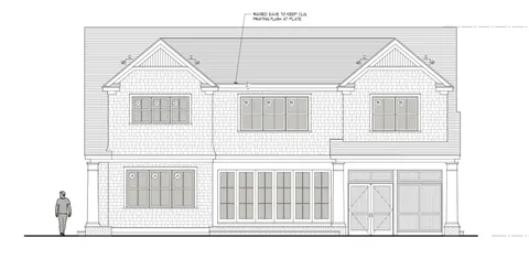 a black and white photo of a living room