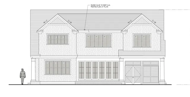 a black and white photo of a living room