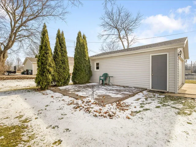 a view of a backyard of the house