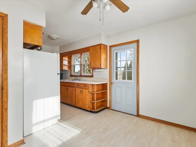 a view of kitchen with windows