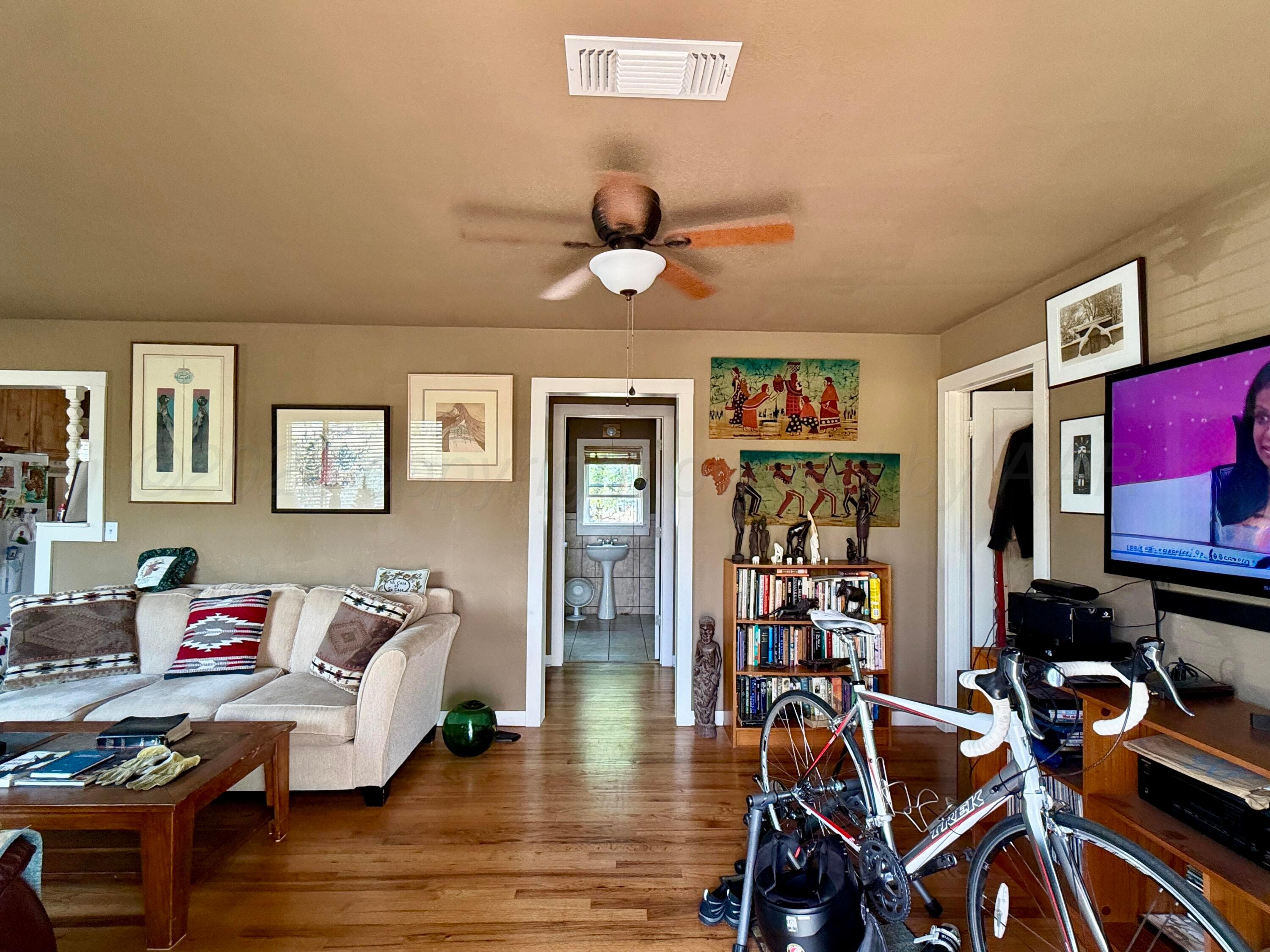 701 Brain Street Borger, TX 79007 - Photo 7 of 18 a living room with furniture and wooden floor