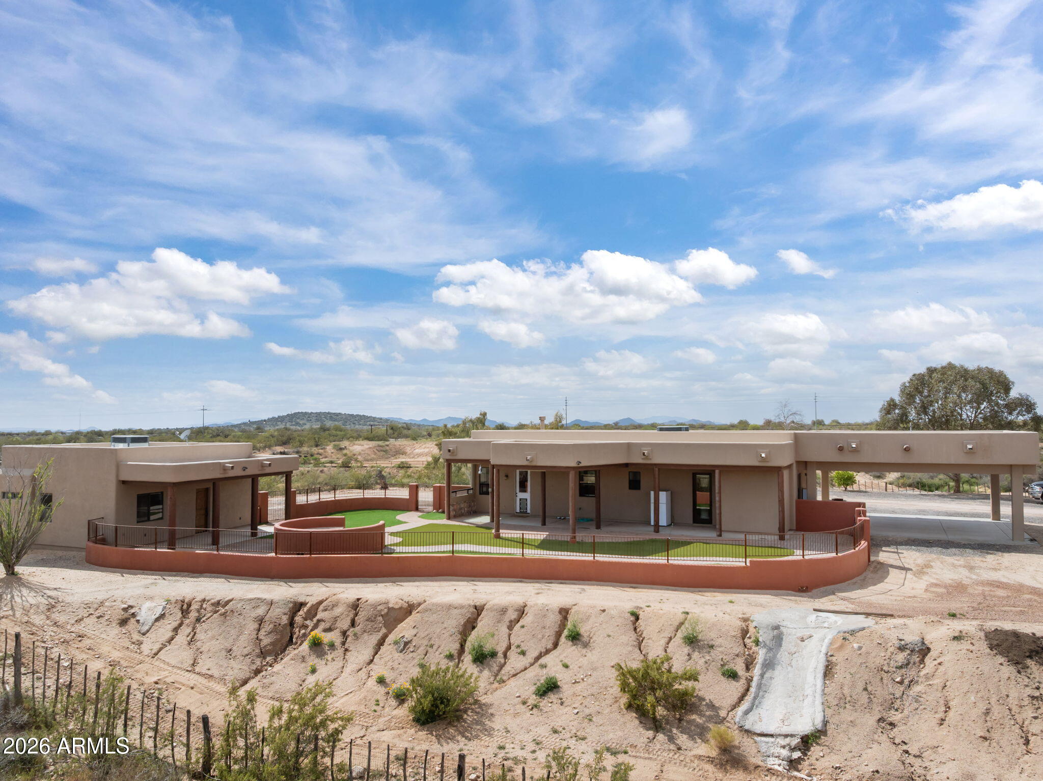 21800 West Hawkeye Road Congress, AZ 85332 - Photo 25 of 61 a front view of a house with a yard