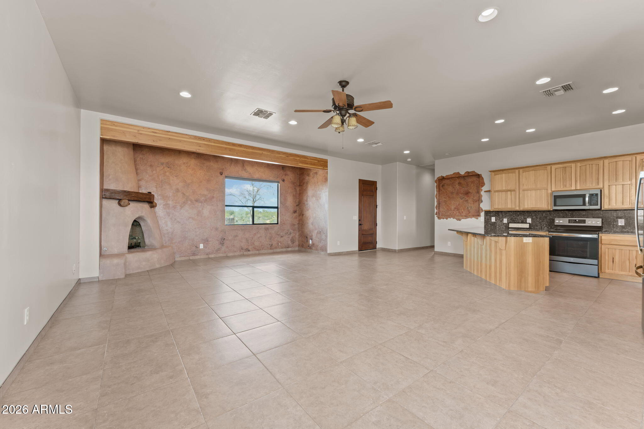 21800 West Hawkeye Road Congress, AZ 85332 - Photo 37 of 61 a view of kitchen with kitchen island white cabinets and stainless steel appliances