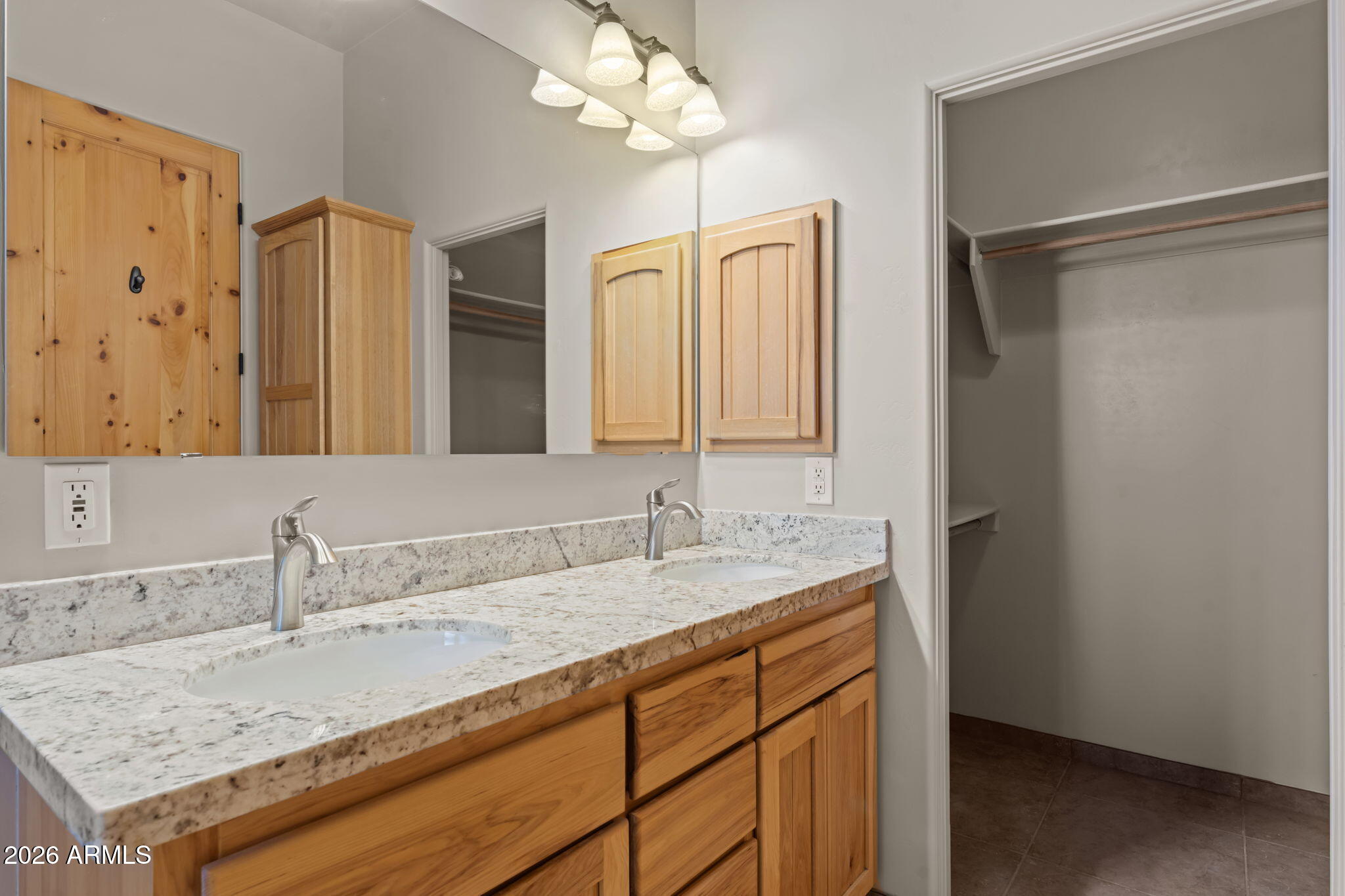 21800 West Hawkeye Road Congress, AZ 85332 - Photo 45 of 61 a bathroom with a granite countertop sink and a mirror