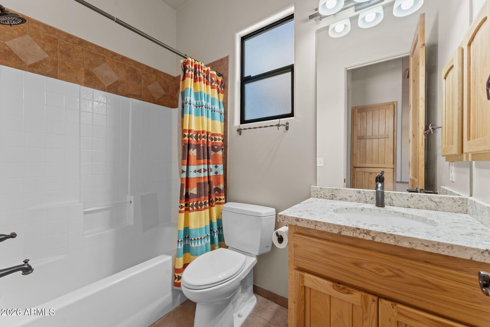 21800 West Hawkeye Road Congress, AZ 85332 - Photo 48 of 61 a bathroom with a sink a toilet and shower
