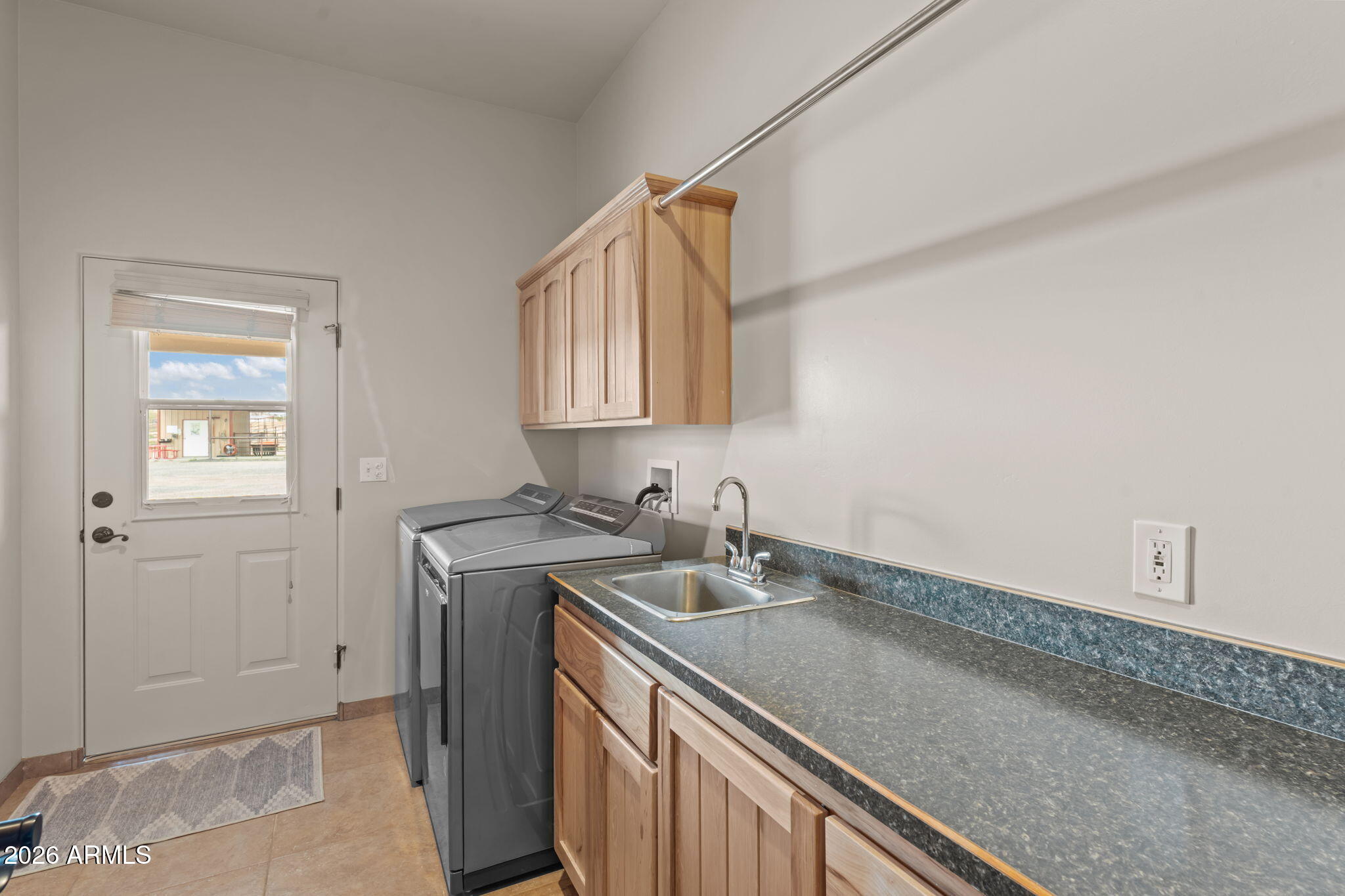 21800 West Hawkeye Road Congress, AZ 85332 - Photo 49 of 61 a bathroom with a sink and a mirror
