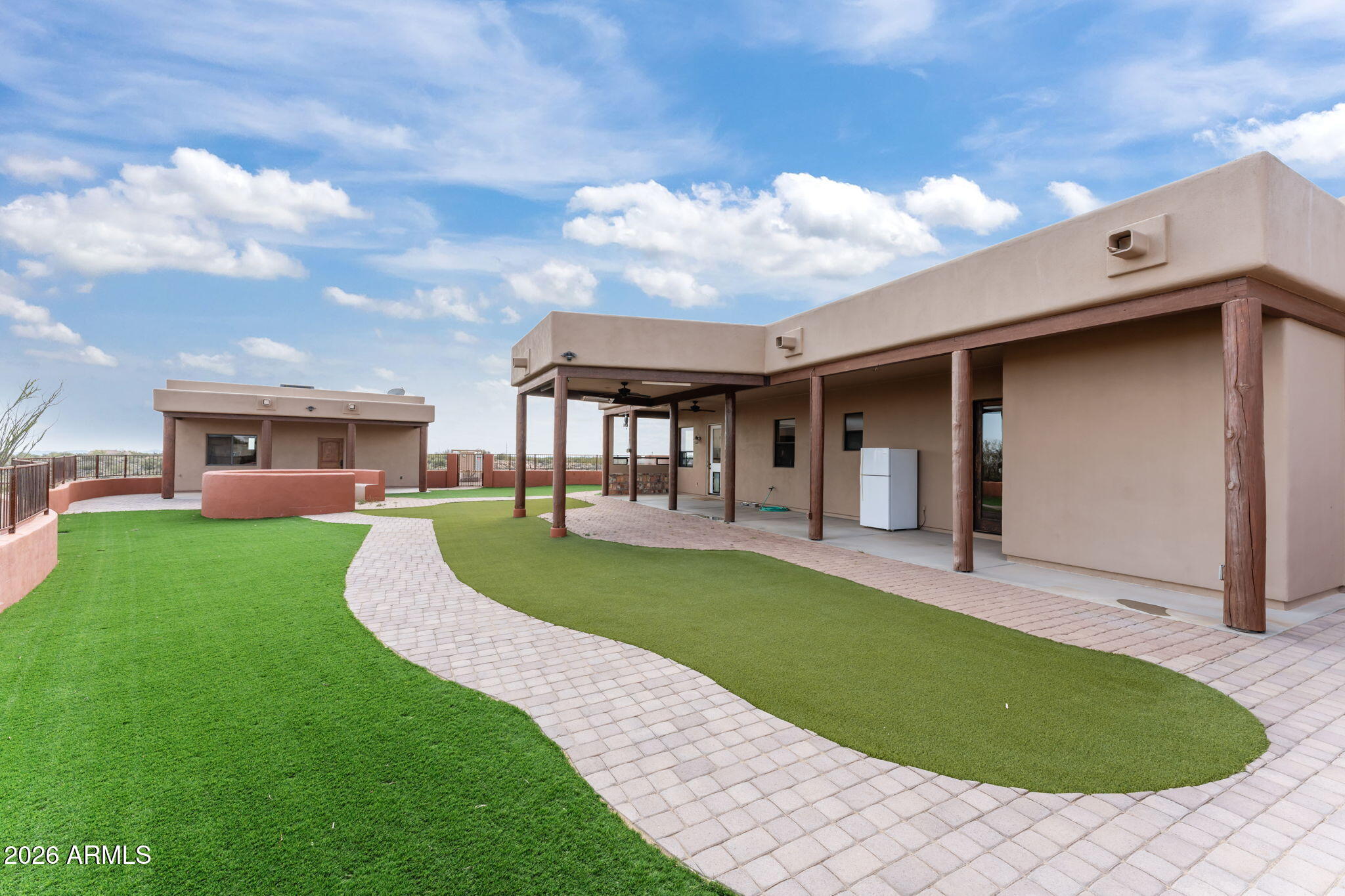 21800 West Hawkeye Road Congress, AZ 85332 - Photo 52 of 61 a view of a patio with a table and chairs