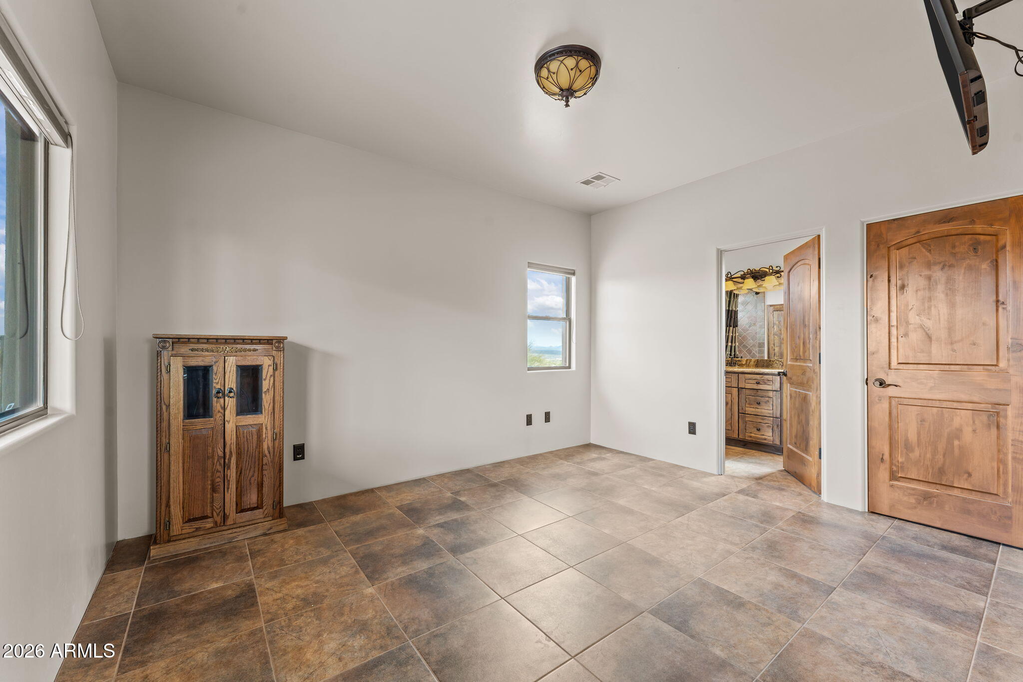 21800 West Hawkeye Road Congress, AZ 85332 - Photo 59 of 61 an empty room with windows and refrigerator