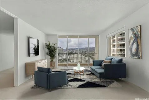 a living room with furniture and a large window