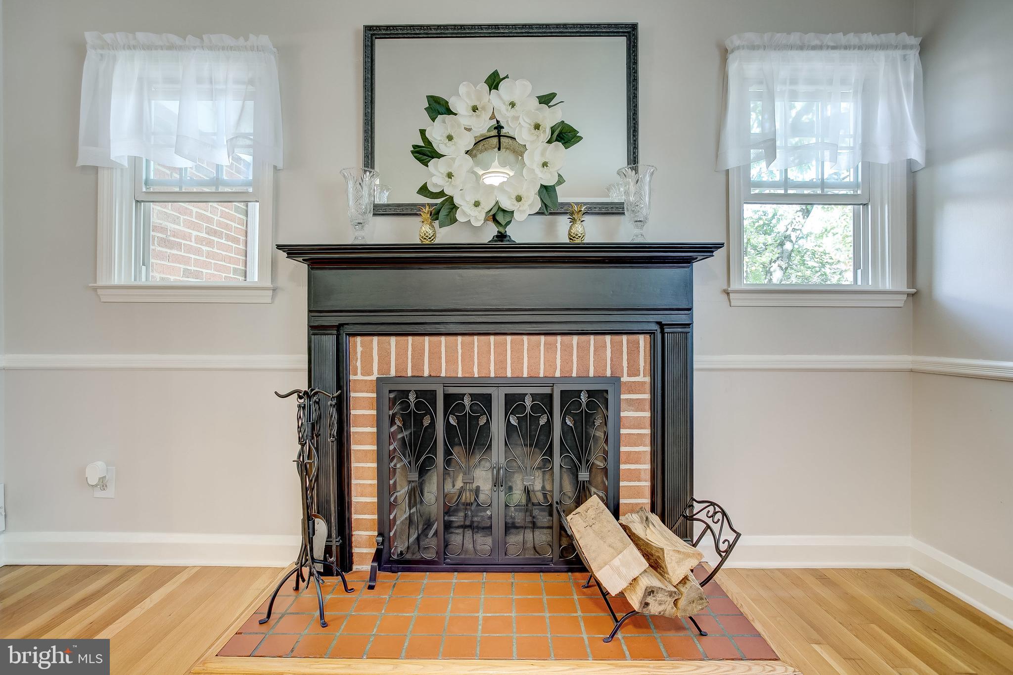 908 Locustvale Road Baltimore, MD 21204 - Photo 16 of 48 wood burning fire place in living room