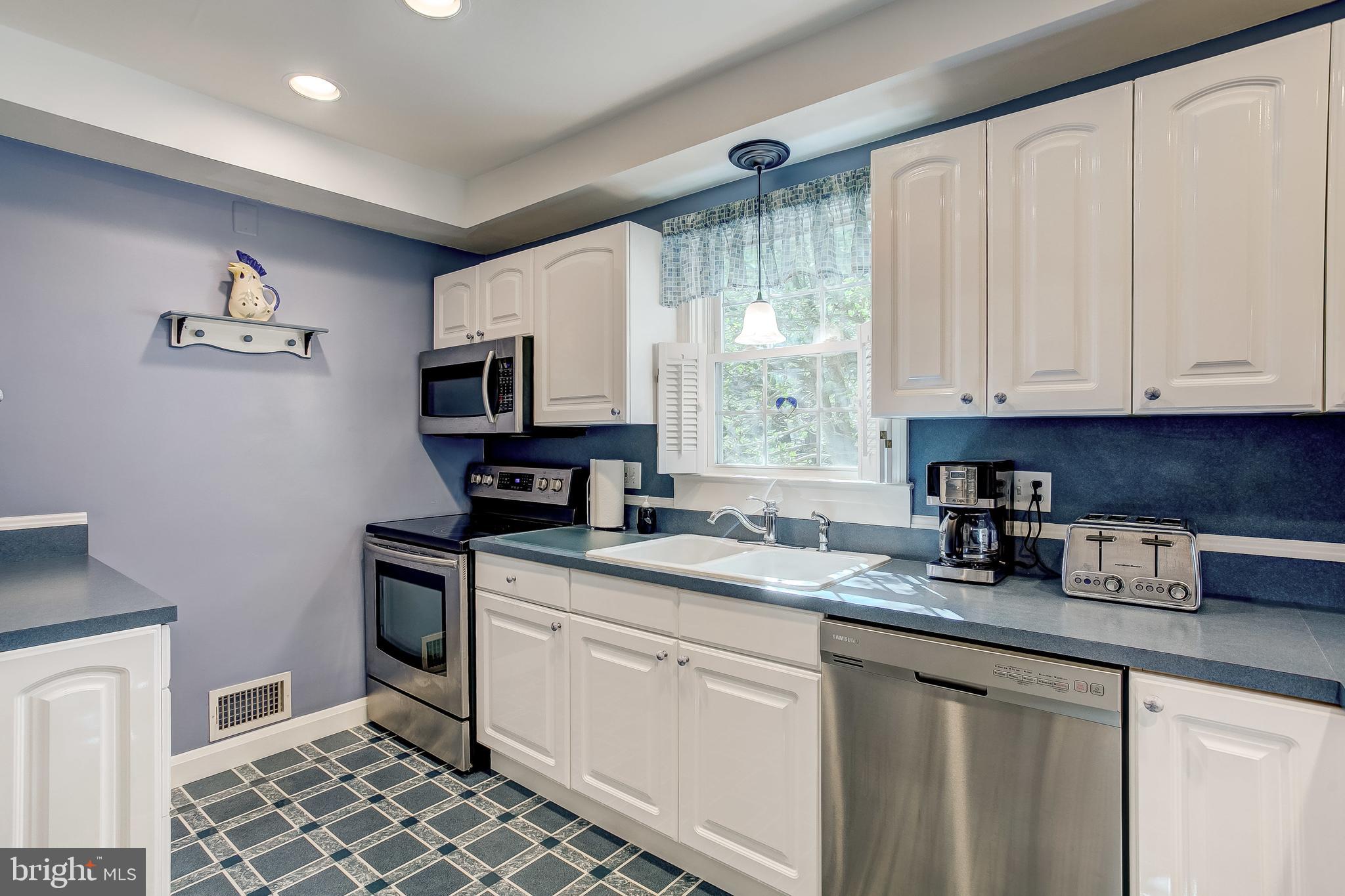 908 Locustvale Road Baltimore, MD 21204 - Photo 20 of 48 kitchen with beautiful white cabinets