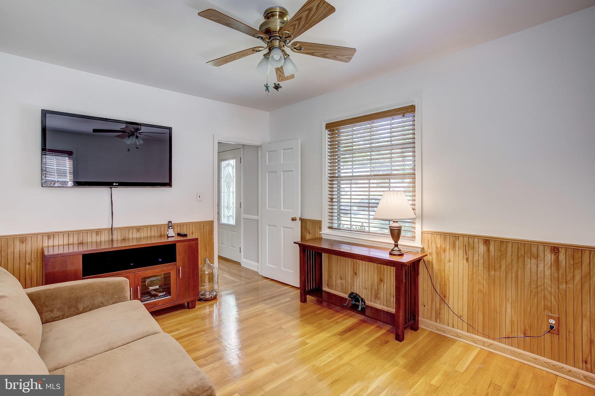908 Locustvale Road Baltimore, MD 21204 - Photo 25 of 48 Den with wainscotting