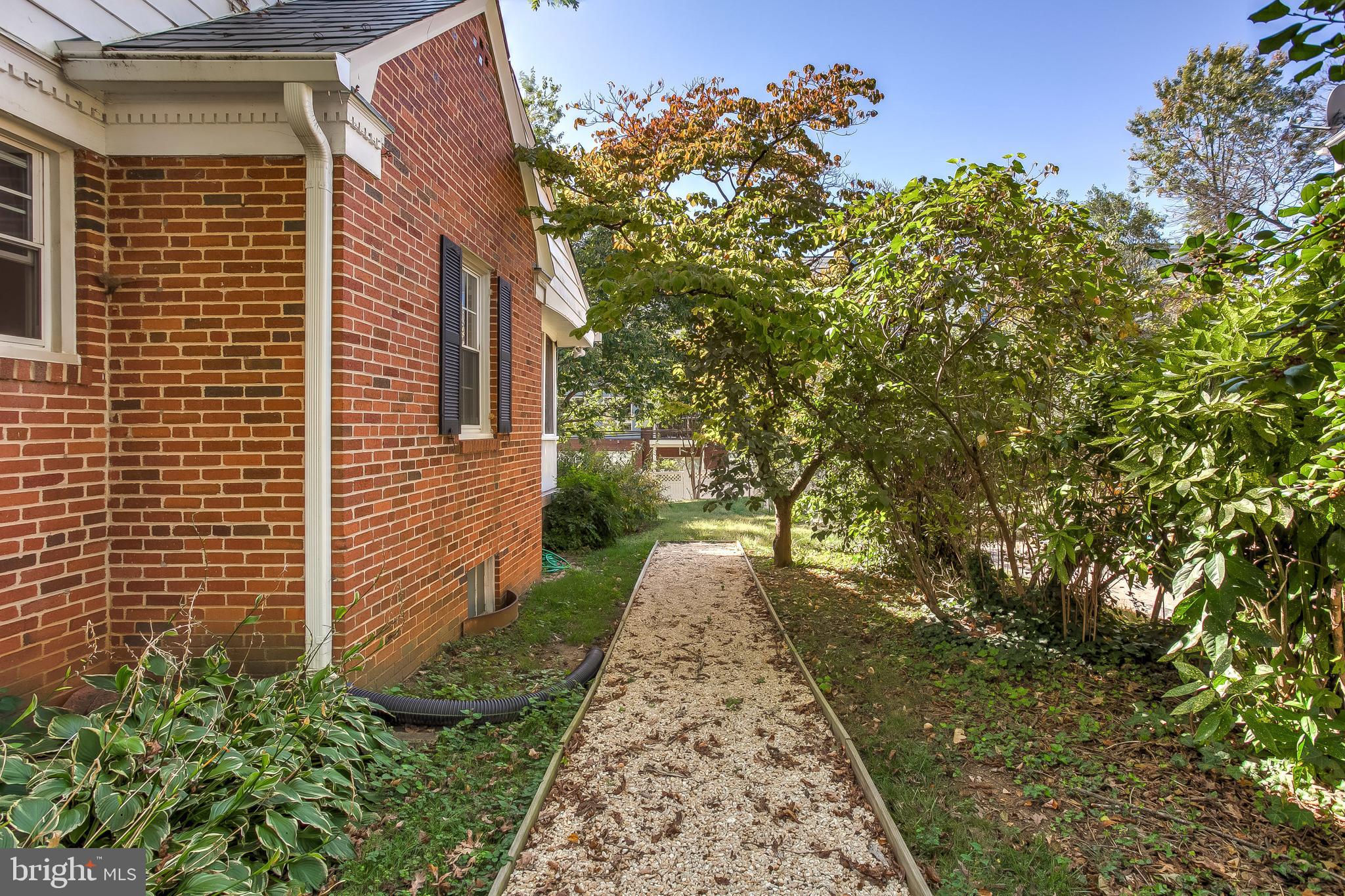 908 Locustvale Road Baltimore, MD 21204 - Photo 5 of 48 Side yard with walkway