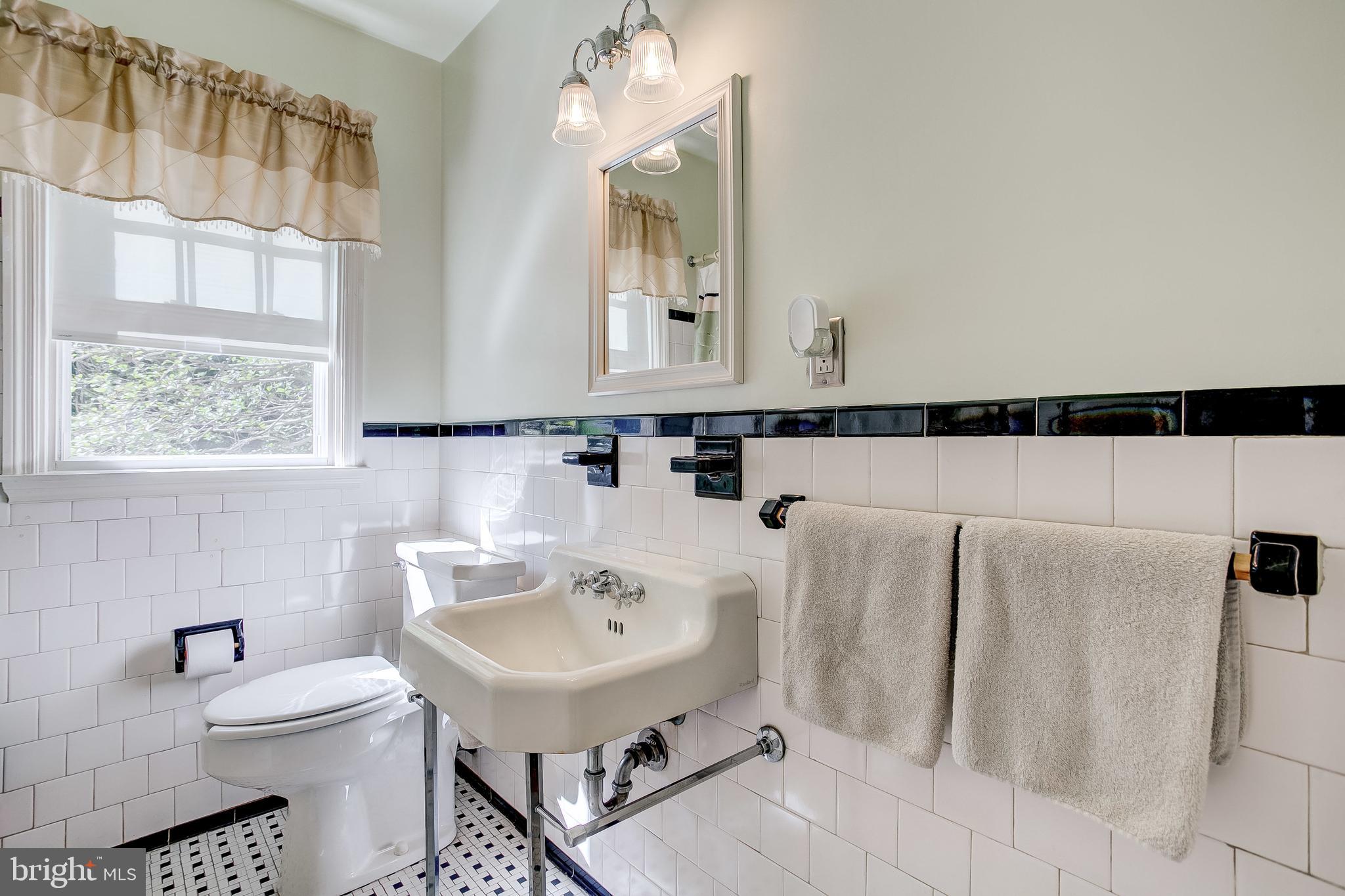 908 Locustvale Road Baltimore, MD 21204 - Photo 43 of 48 main level full bath with vintage tile