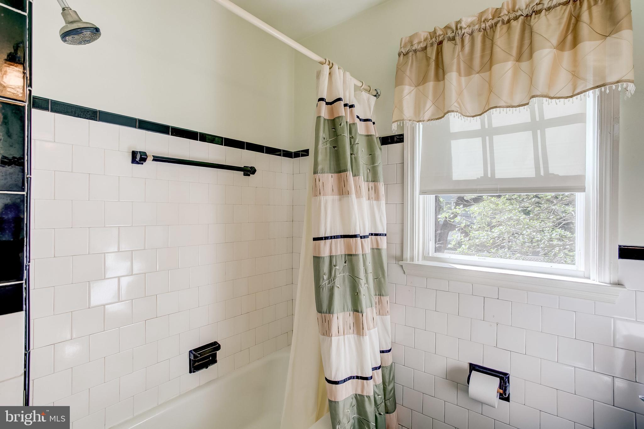 908 Locustvale Road Baltimore, MD 21204 - Photo 45 of 48 main level bathroom