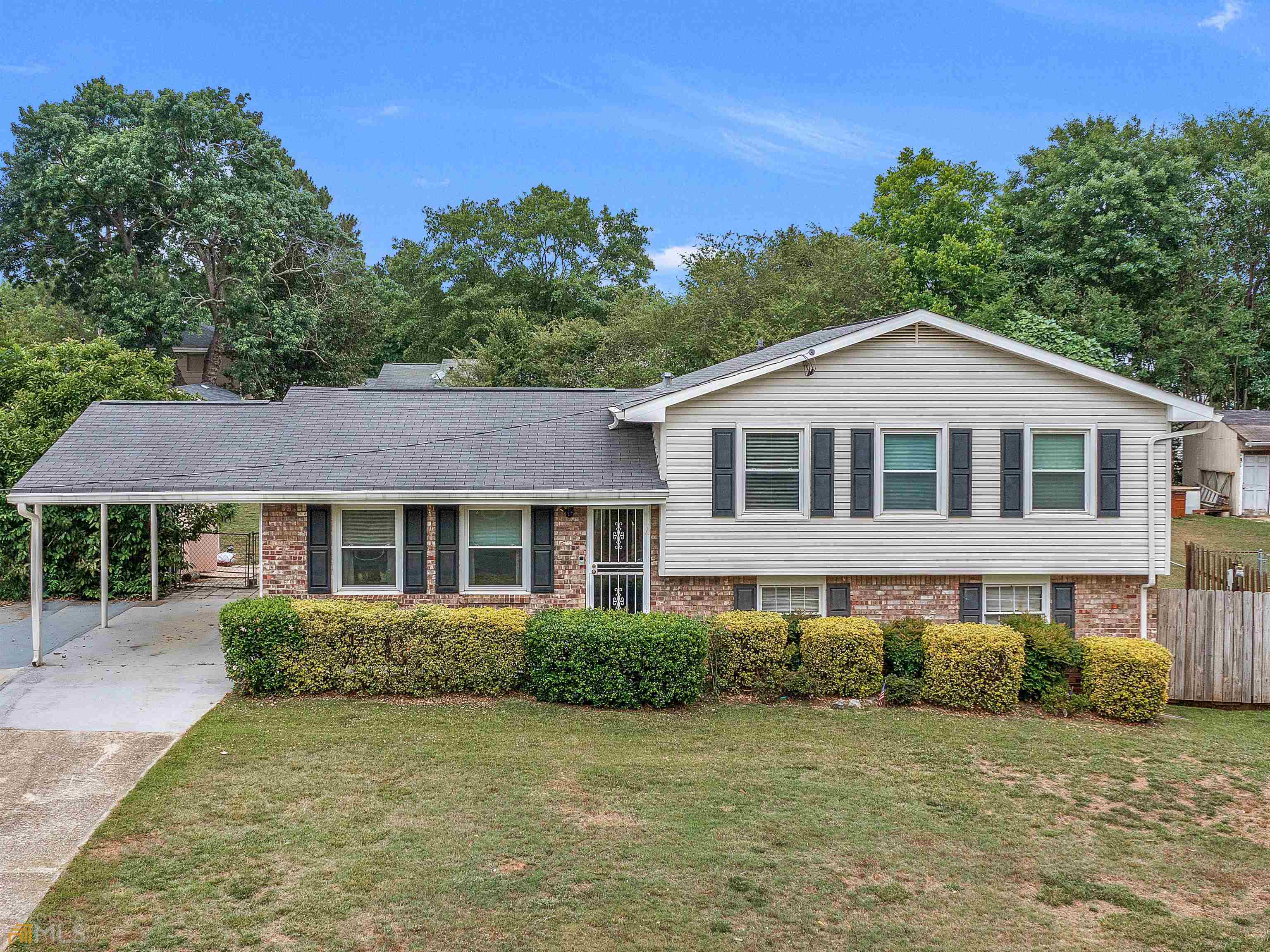2536 Rex Road Ellenwood, GA 30294 - Photo 1 of 1 a view of a house with a yard