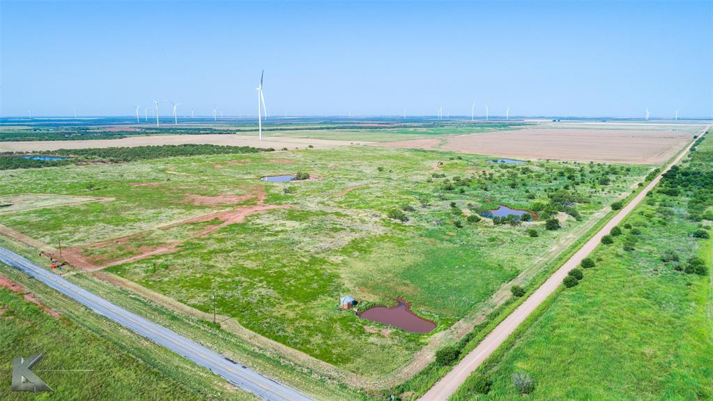 8244 Farm To Market 266 Haskell, TX 79521 - Photo 2 of 40 View of rural area with abundant farmland and a nearby body of water