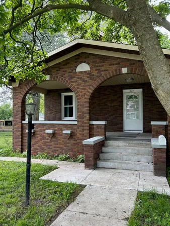 a front view of house with yard