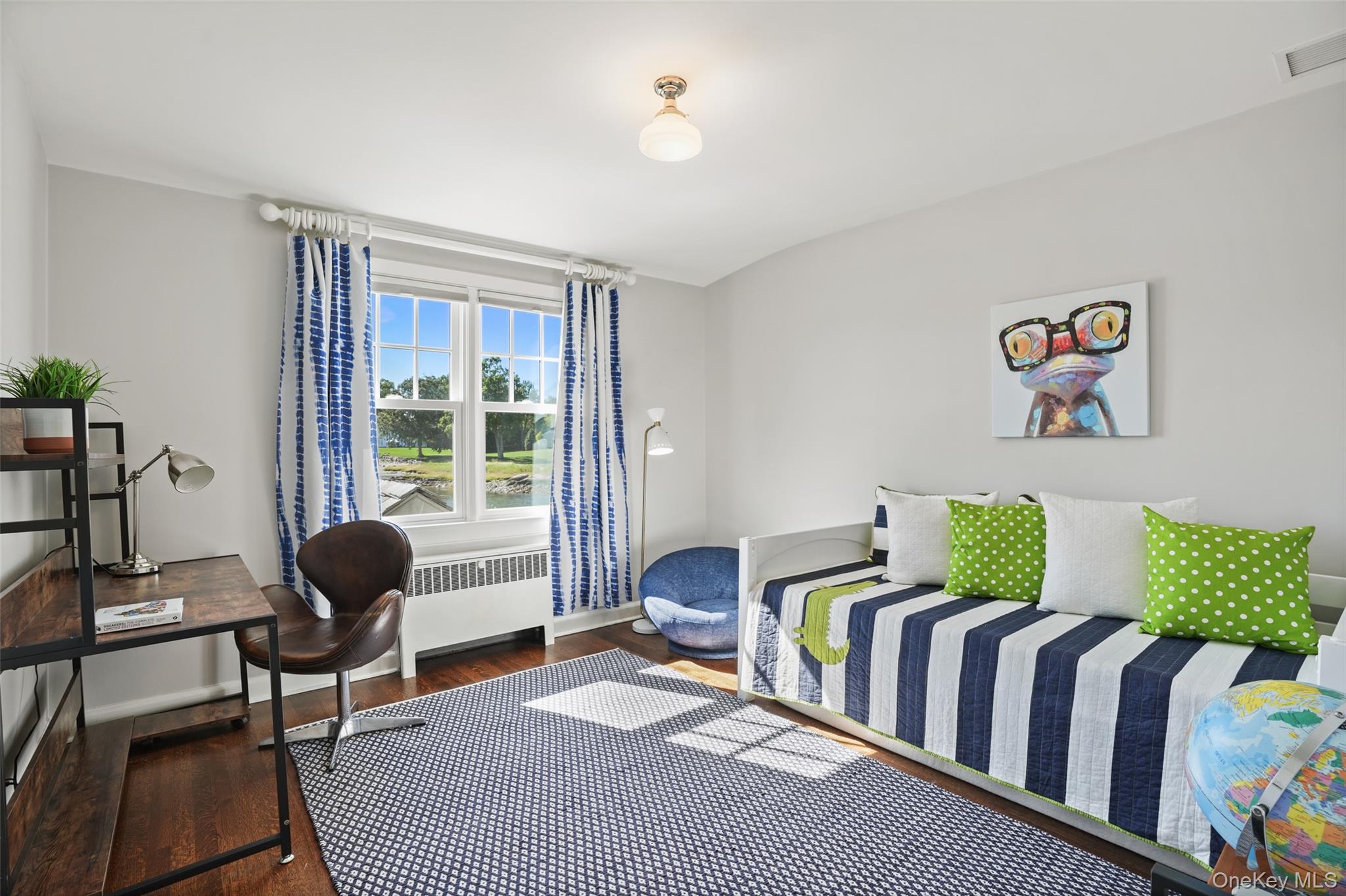 6 Pine Island Road Rye, NY 10580 - Photo 21 of 38 a bedroom with furniture and a window