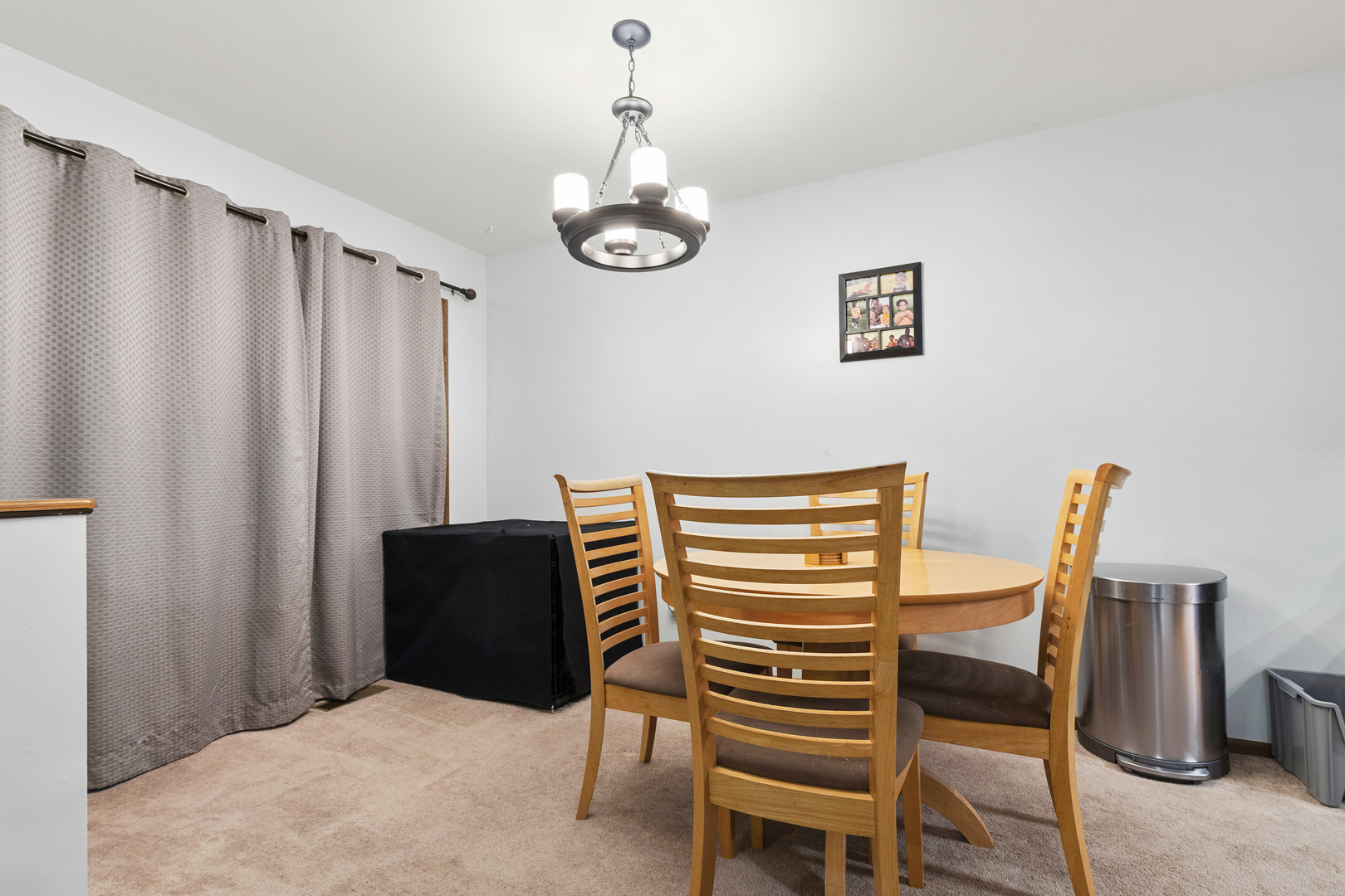 1723 Cedarbrook Court Sycamore, IL 60178 - Photo 3 of 11 a bedroom with a bed and a chair