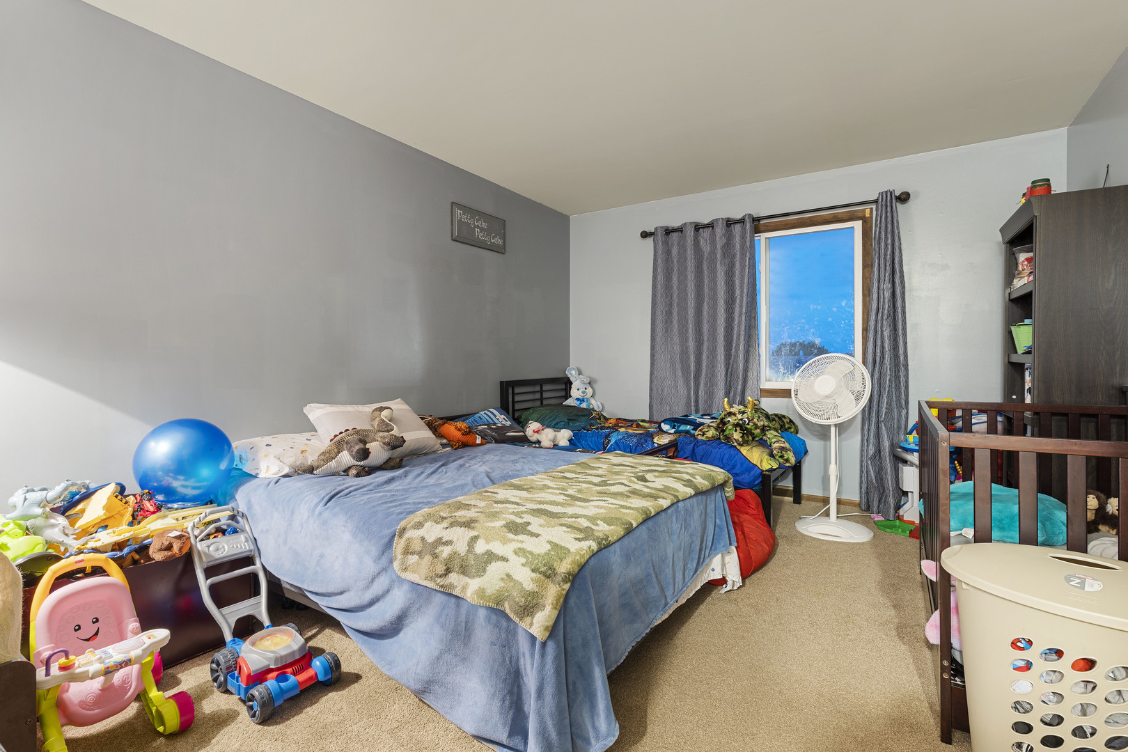 1723 Cedarbrook Court Sycamore, IL 60178 - Photo 6 of 11 a bedroom with bed and a window