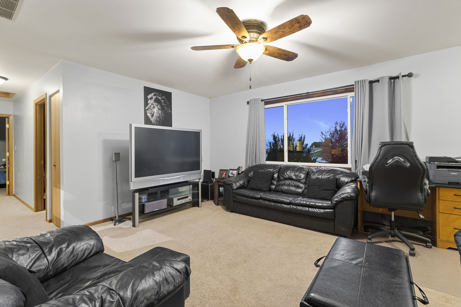 1723 Cedarbrook Court Sycamore, IL 60178 - Photo 8 of 11 a living room with furniture and a flat screen tv