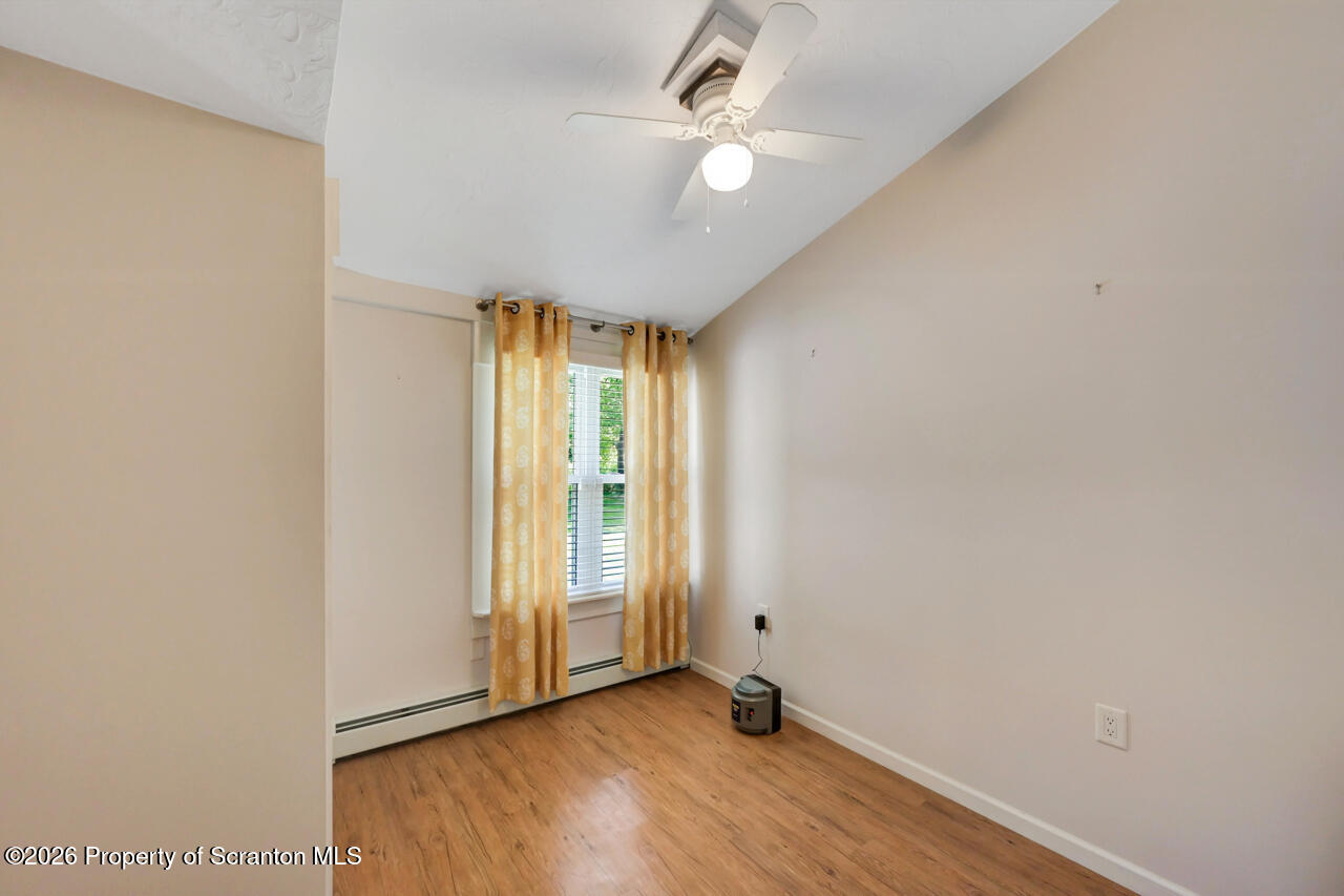 3660 Aberdeen Road Moscow, PA 18444 - Photo 33 of 68 an empty room with closet and a ceiling fan