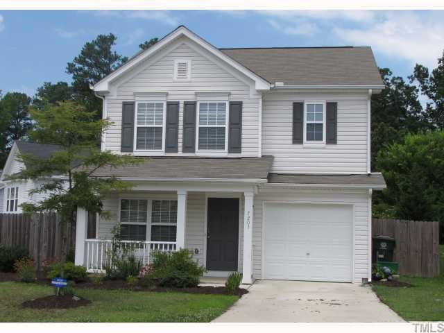 7203 Monarda Court Raleigh, NC 27616 - Photo 1 of 12 Front with beautiful extensive landscaping.