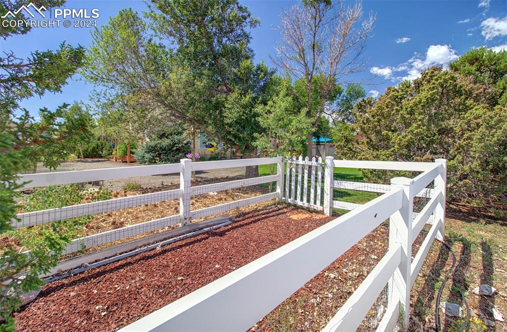 12110 Lazy E Road Peyton, CO 80831 - Photo 36 of 50 a view of a balcony with an outdoor space