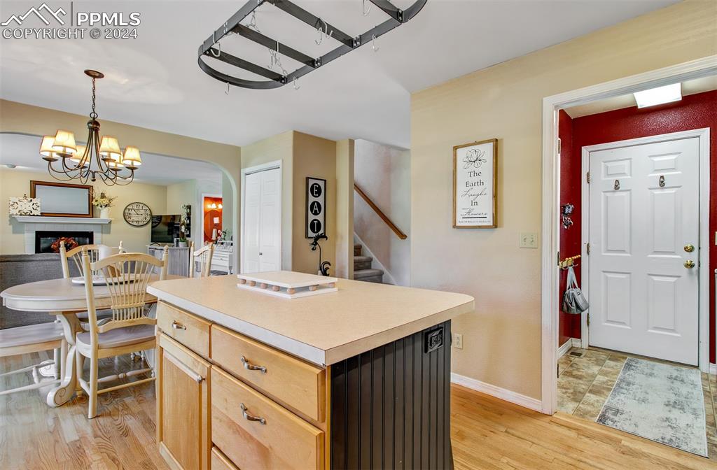 12110 Lazy E Road Peyton, CO 80831 - Photo 10 of 50 a view of a kitchen counter space and breakfast area