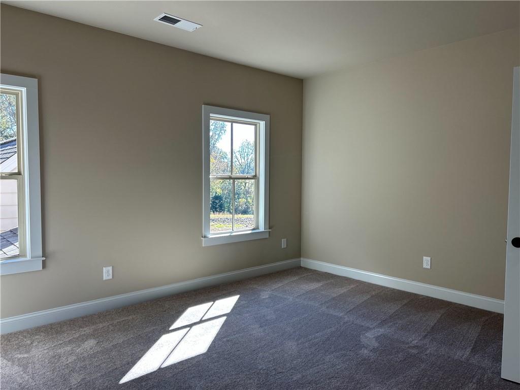 88 Morrison Street Watkinsville, GA 30677 - Photo 13 of 16 an empty room with a window
