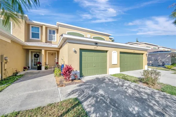 a front view of a house with yard