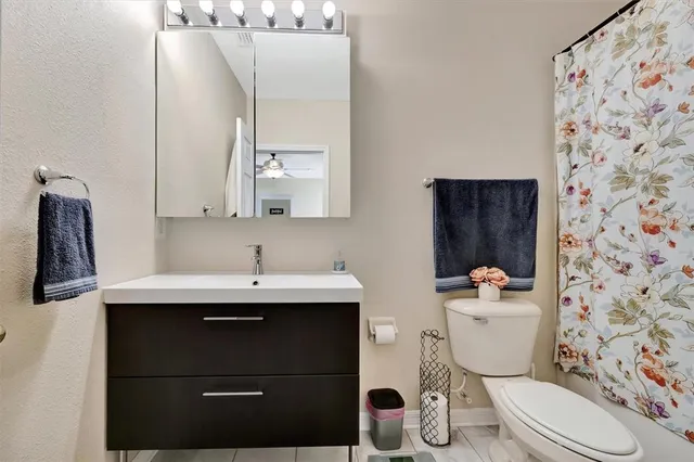 a bathroom with a sink and a toilet