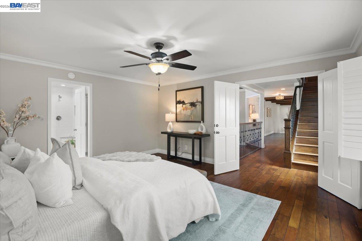 1784 Creek Road Livermore, CA 94550 - Photo 19 of 40 a spacious bedroom with a bed and a table in it