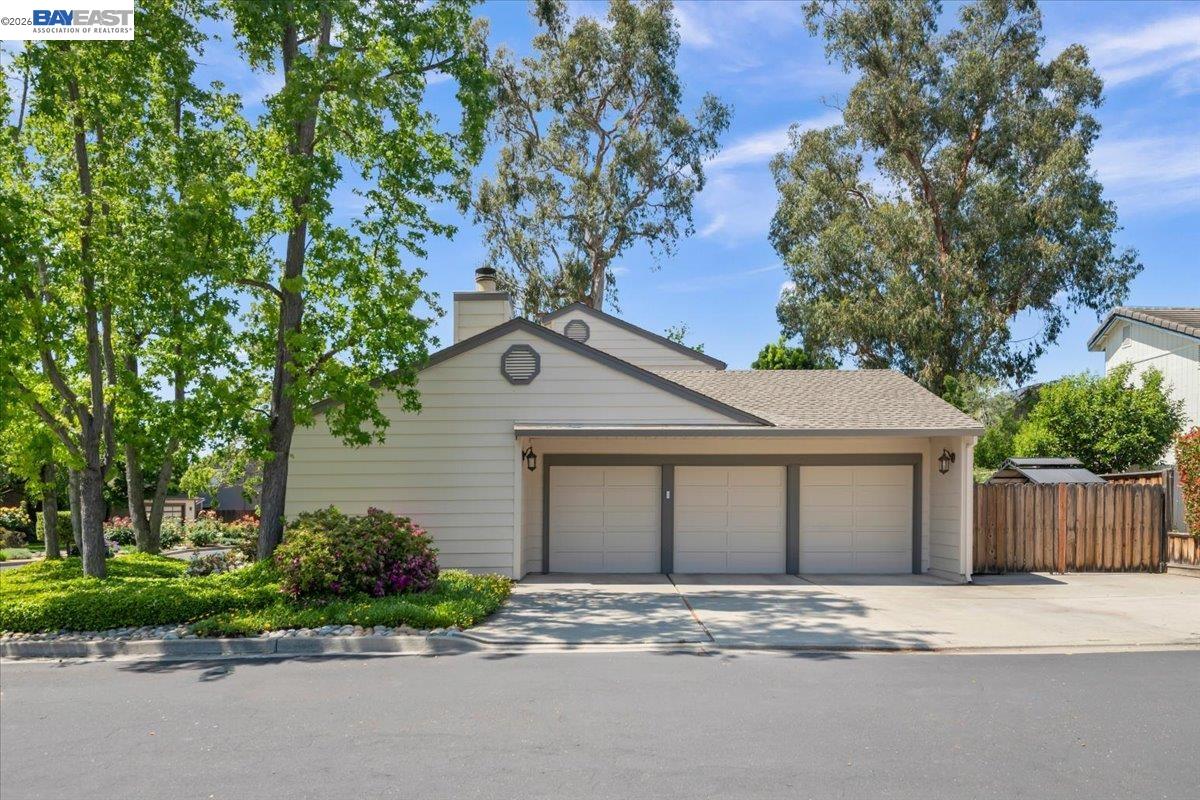 1784 Creek Road Livermore, CA 94550 - Photo 3 of 40 a house with a tree in front of it