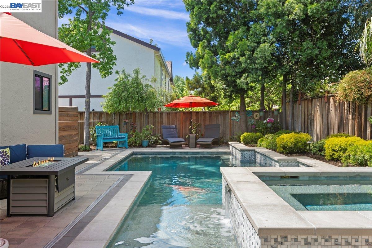 1784 Creek Road Livermore, CA 94550 - Photo 36 of 40 a view of a house with backyard sitting area and swimming pool