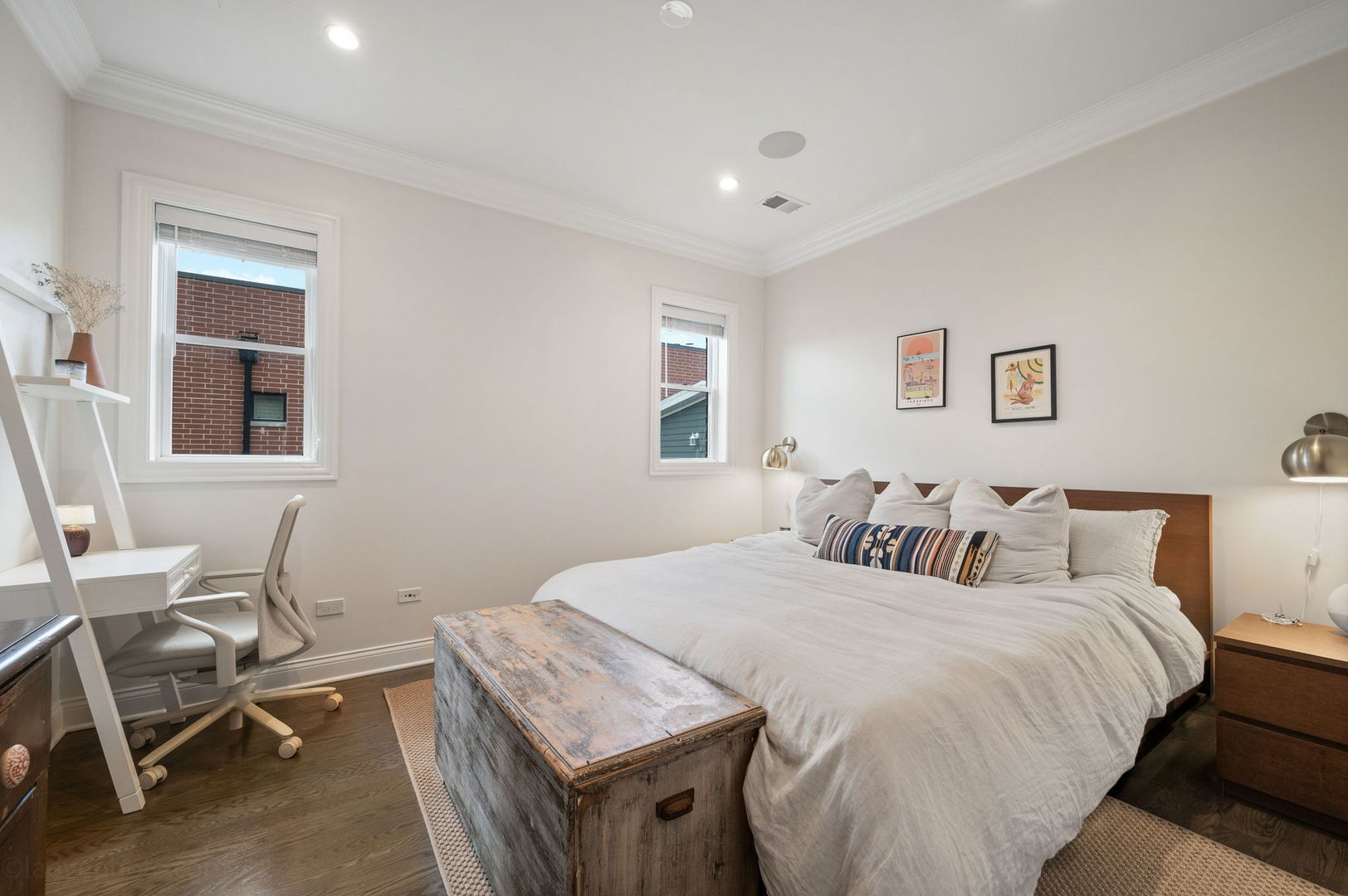 2700 North Wayne Avenue, Unit 3N Chicago, IL 60614 - Photo 10 of 22 a bedroom with a bed and wooden floor