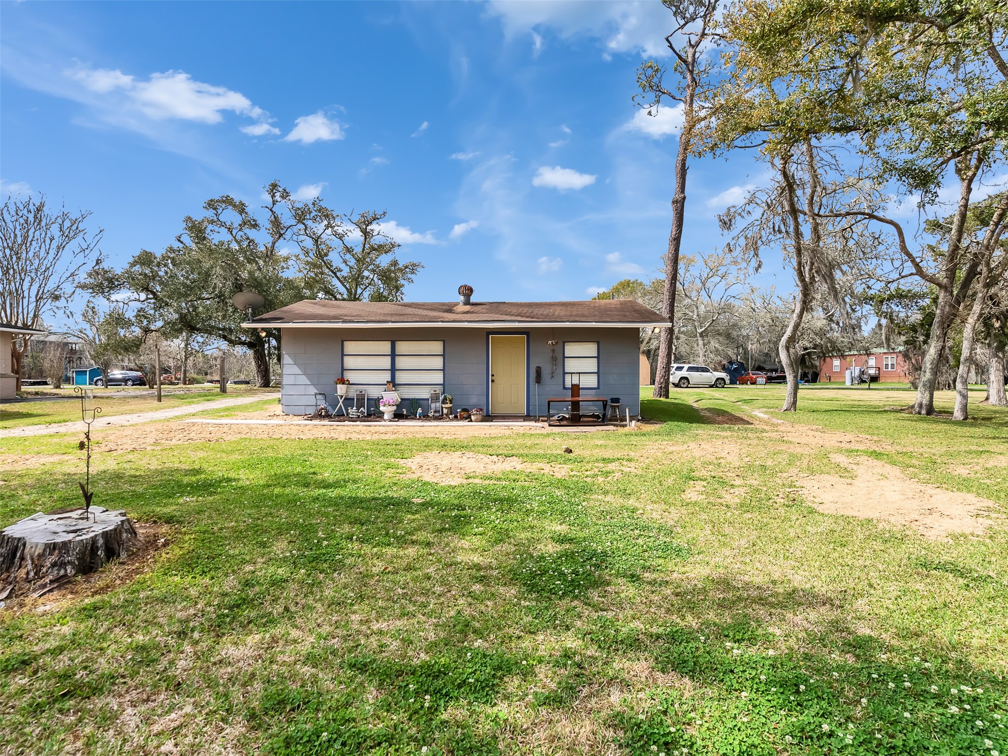 3315 St Anne Street Liverpool, TX 77577 - Photo 19 of 48 a front view of a house with a yard
