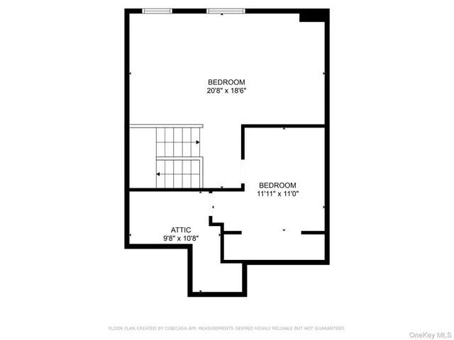 a picture of a bench in front of a wall